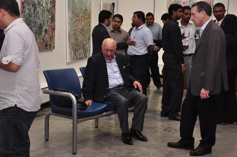 man sitting in hospital waiting room 